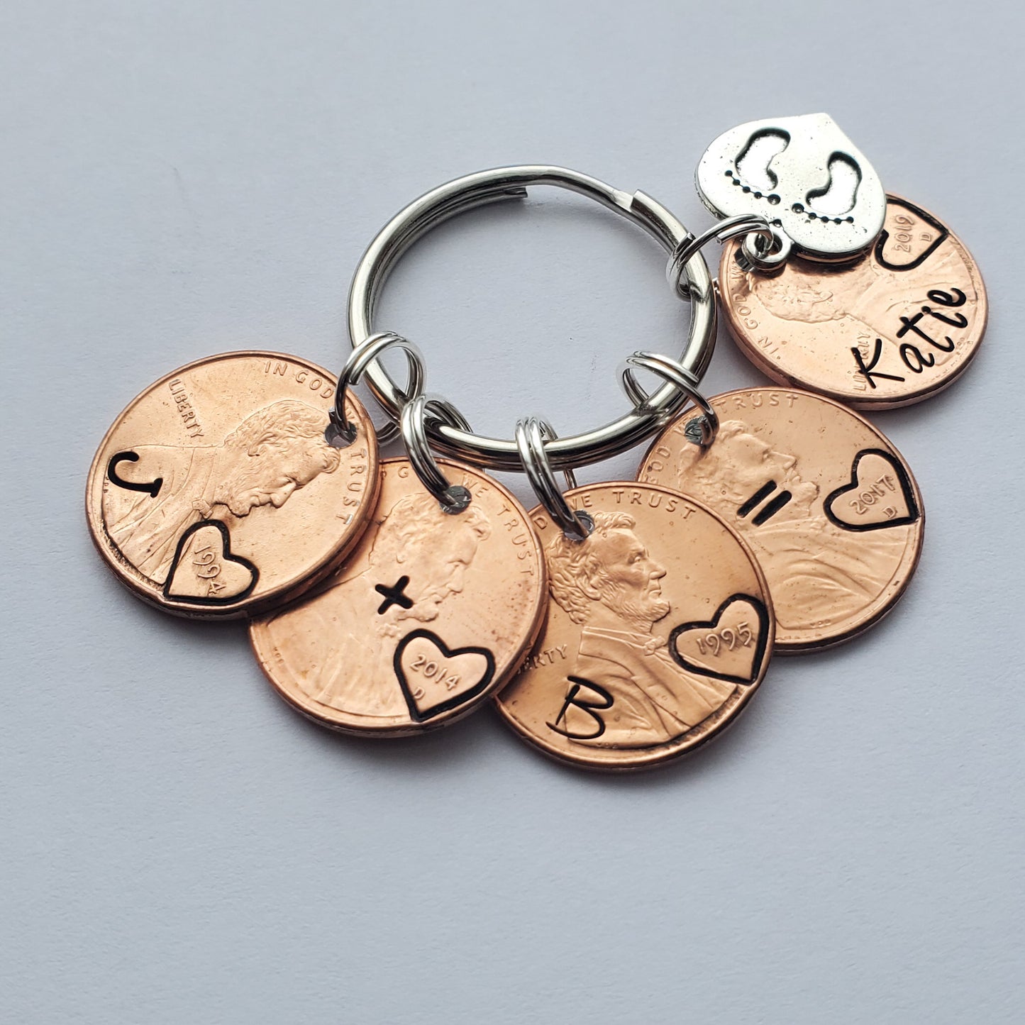 Personalized Penny Keychain with multiple pennies, each representing a different special occasion- third view