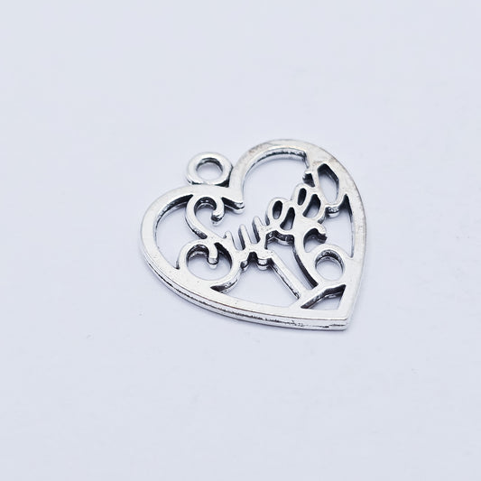 silver heart with sweet 16 in the middle