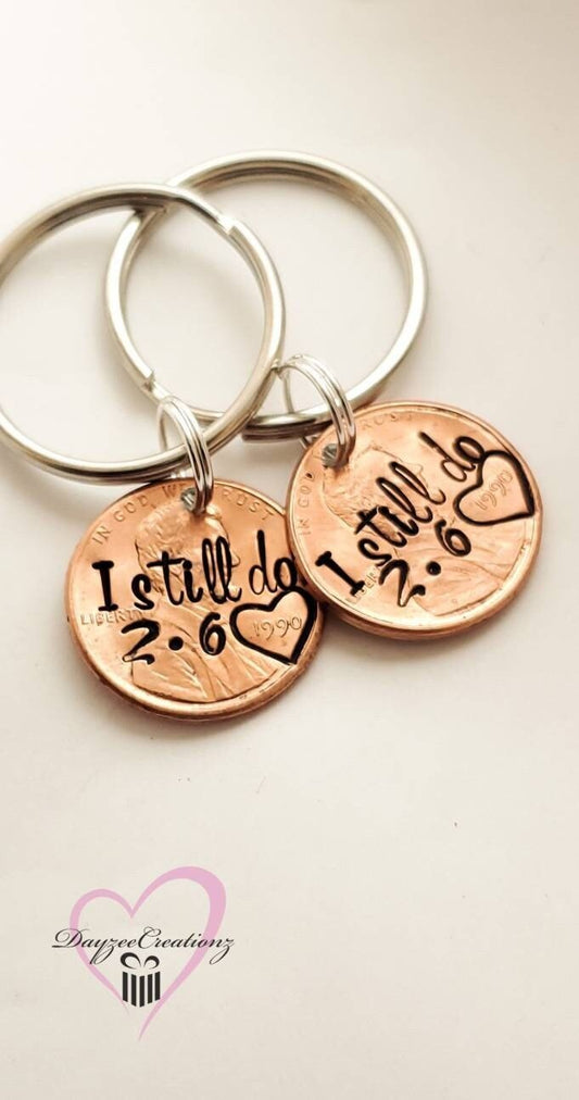 Pair of 2 I still do penny keychains stamped center 1