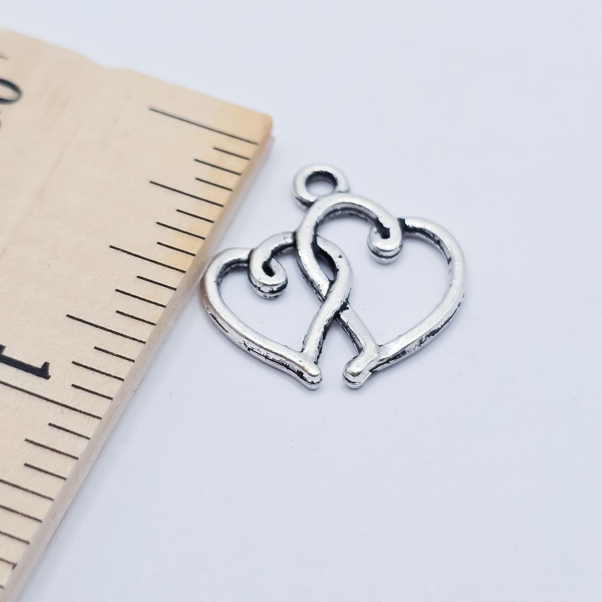 double interlocking silver hearts charm 3