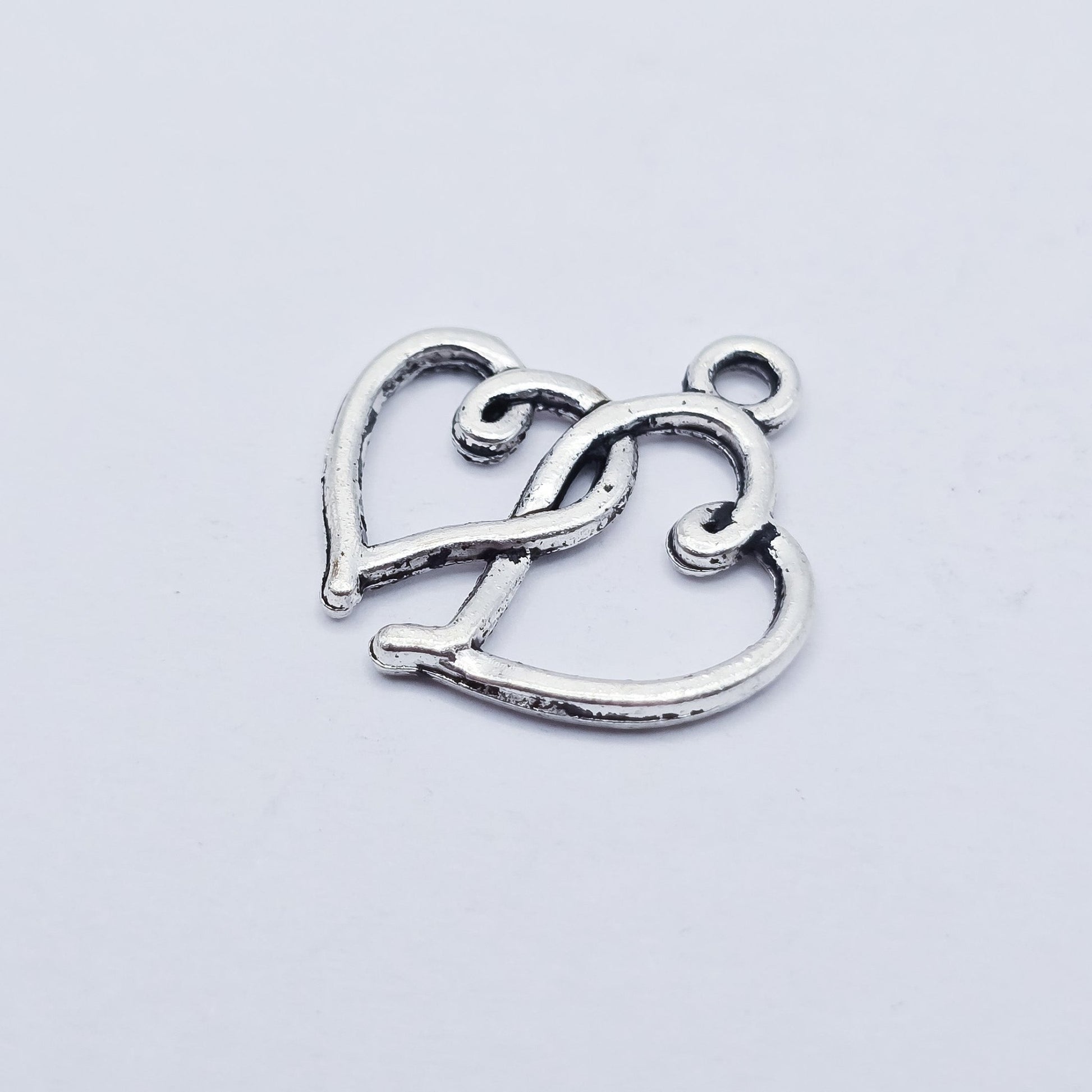 double interlocking silver hearts charm 2