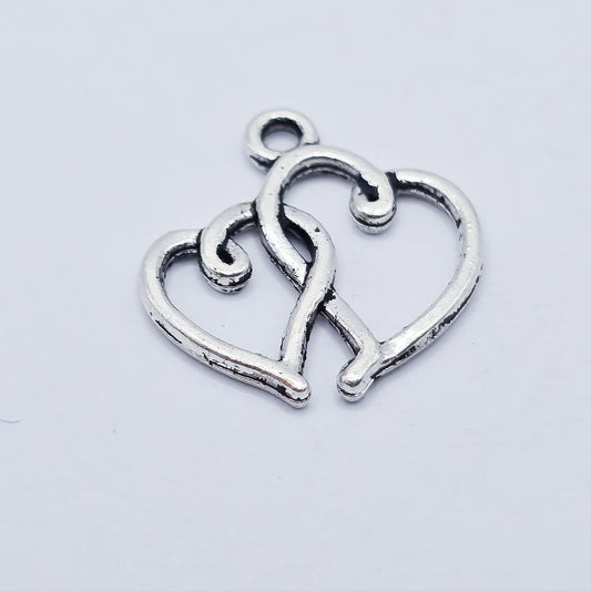 double interlocking silver hearts charm