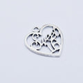 silver heart with sweet 16 in the middle