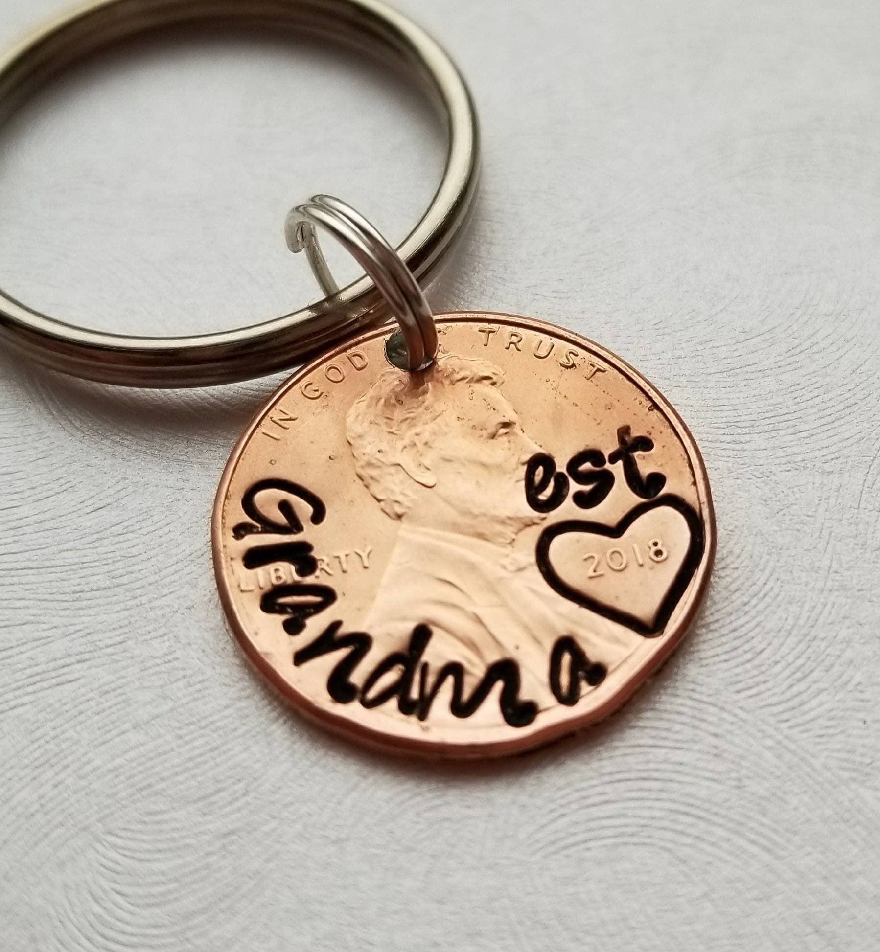 Personalized Penny Keychain with "Grandma" stamped on the curve and "est." stamped above year DAYZEECREATIONZ, PERSONALIZED GIFTS