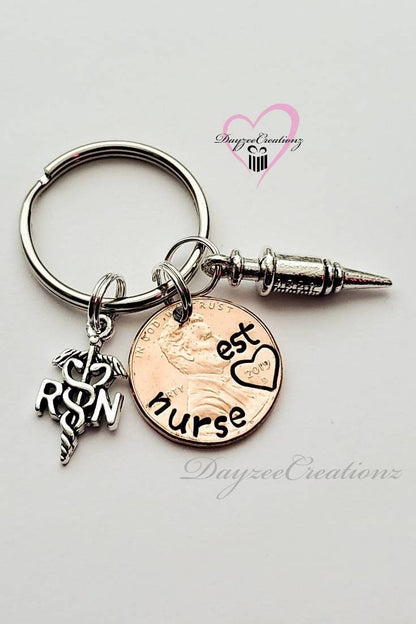 Nurse penny keychain with charms shown